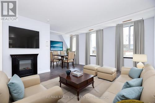 504 - 135 Maitland Street, Toronto, ON - Indoor Photo Showing Living Room With Fireplace