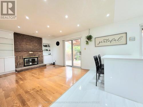 Upper 1 - 1491 Prince John Circle, Oakville, ON - Indoor Photo Showing Living Room With Fireplace