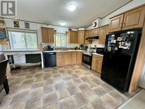 549 Speedway Road, Vanderhoof, BC - Indoor Photo Showing Kitchen With Double Sink