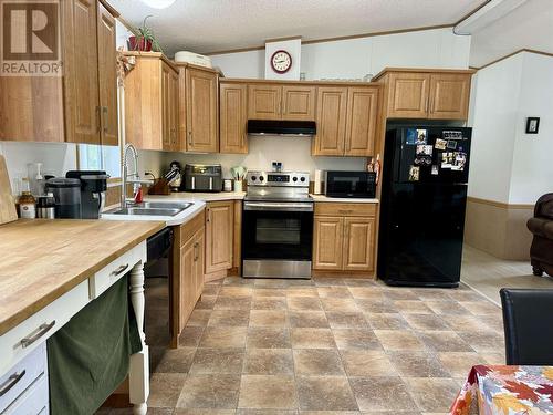 549 Speedway Road, Vanderhoof, BC - Indoor Photo Showing Kitchen With Double Sink