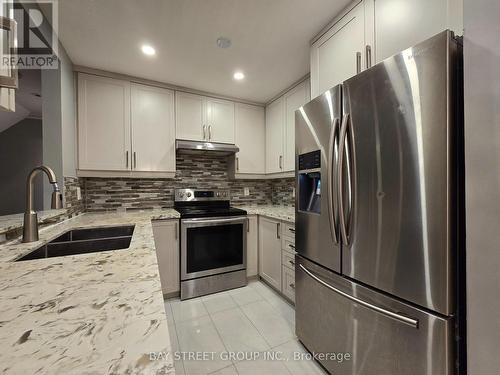 C5 - 108 Finch Avenue W, Toronto, ON - Indoor Photo Showing Kitchen With Double Sink With Upgraded Kitchen