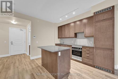 407 - 9075 Jane Street, Vaughan, ON - Indoor Photo Showing Kitchen