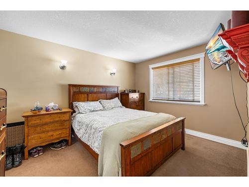 3733 Highway 3, Erickson, BC - Indoor Photo Showing Bedroom