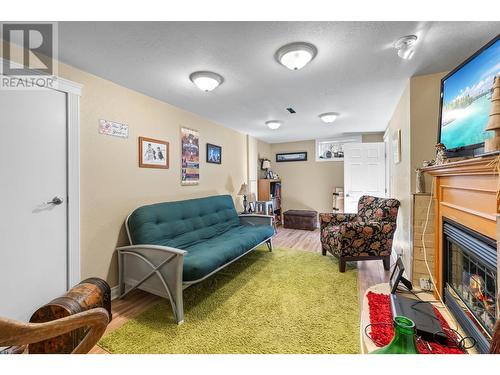 3733 3 Highway, Erickson, BC - Indoor Photo Showing Living Room With Fireplace