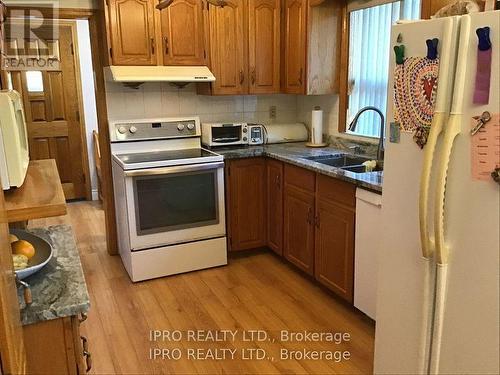 98 North Carson Street, Toronto, ON - Indoor Photo Showing Kitchen With Double Sink