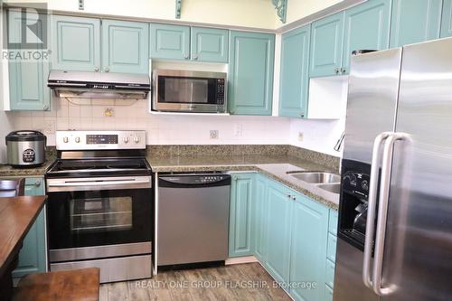 49 Guildpark Pathway, Toronto, ON - Indoor Photo Showing Kitchen With Double Sink