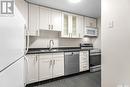 103 325 Kingsmere Boulevard, Saskatoon, SK  - Indoor Photo Showing Kitchen With Double Sink 