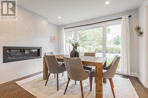 3472 Spruce Avenue, Burlington, ON - Indoor Photo Showing Dining Room With Fireplace