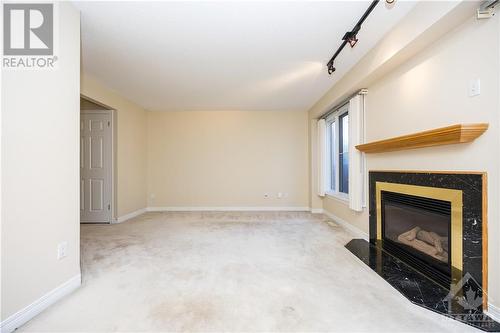 21 Grenadier Way, Ottawa, ON - Indoor With Fireplace