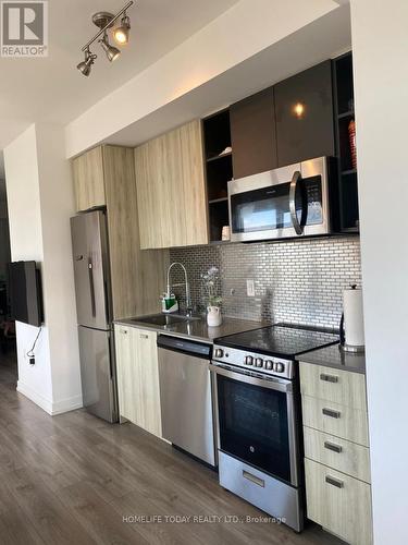 601 - 10 De Boers Drive, Toronto, ON - Indoor Photo Showing Kitchen With Stainless Steel Kitchen