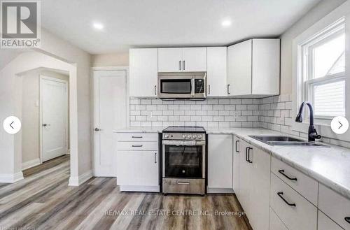 Upper - 2 Lydia Street, Hamilton, ON - Indoor Photo Showing Kitchen With Double Sink