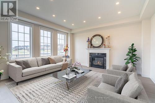 8 Pond View Gate, Hamilton, ON - Indoor Photo Showing Living Room With Fireplace