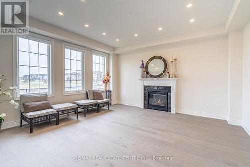 8 Pond View Gate, Hamilton, ON - Indoor Photo Showing Living Room With Fireplace