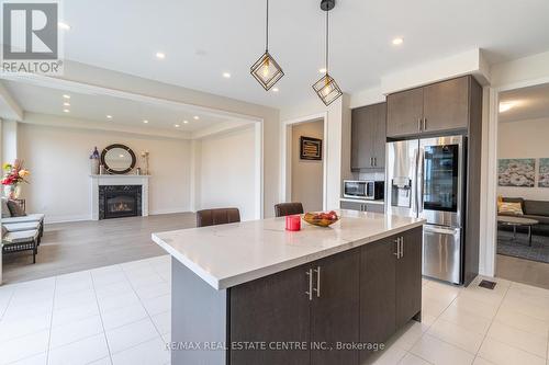 8 Pond View Gate, Hamilton, ON - Indoor Photo Showing Kitchen With Fireplace