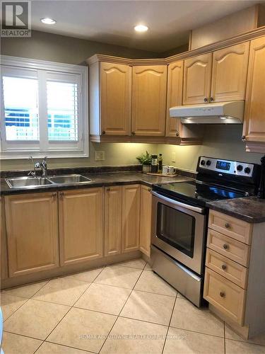 11056 Firgrove Drive, Windsor, ON - Indoor Photo Showing Kitchen With Double Sink