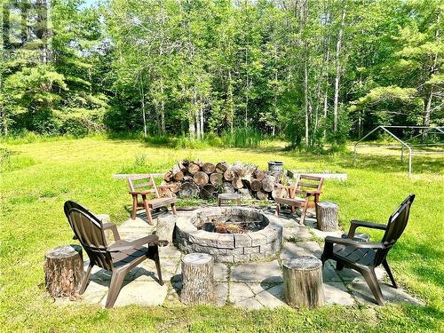 Enjoy your nights by this stone firepit - 322 Gardiner Road, Perth, ON - Outdoor