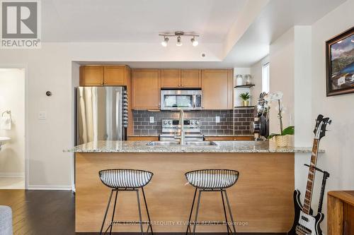 125 - 20 Elsie Lane, Toronto, ON - Indoor Photo Showing Kitchen With Double Sink