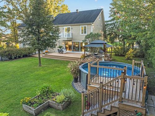 Cour - 1824 Rue Bachand, Carignan, QC - Outdoor With Above Ground Pool