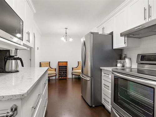 308-2311 Mills Rd, Sidney, BC - Indoor Photo Showing Kitchen With Stainless Steel Kitchen With Upgraded Kitchen