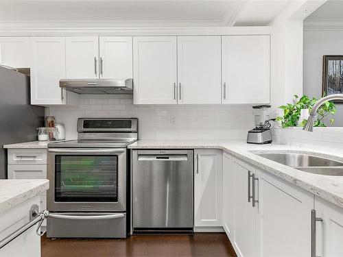 308-2311 Mills Rd, Sidney, BC - Indoor Photo Showing Kitchen With Stainless Steel Kitchen With Double Sink