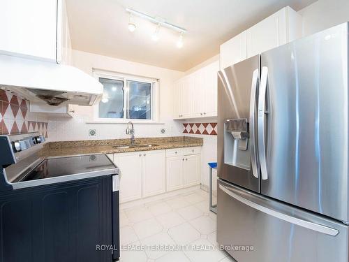 18 Rosette Crt, Toronto, ON - Indoor Photo Showing Kitchen With Double Sink