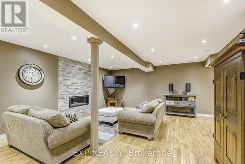 3 Cowper Court, Hamilton, ON - Indoor With Fireplace