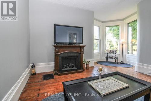 3088 Base Line, Otonabee-South Monaghan, ON - Indoor Photo Showing Living Room With Fireplace