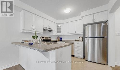 32 Goldeye Street, Whitby, ON - Indoor Photo Showing Kitchen With Double Sink