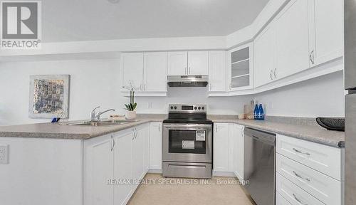 32 Goldeye Street, Whitby, ON - Indoor Photo Showing Kitchen With Double Sink