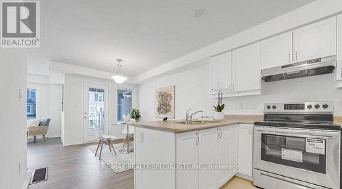 32 Goldeye Street, Whitby, ON - Indoor Photo Showing Kitchen With Double Sink