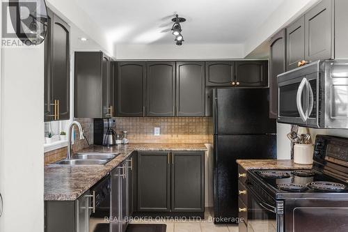 101 Wessenger Drive S, Barrie, ON - Indoor Photo Showing Kitchen With Double Sink