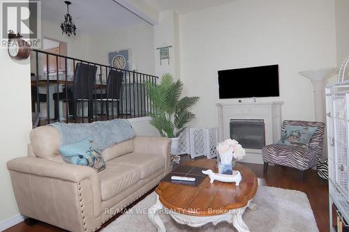 2244 - 2244 Marine Drive, Oakville, ON - Indoor Photo Showing Living Room With Fireplace