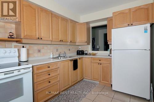 2244 - 2244 Marine Drive, Oakville, ON - Indoor Photo Showing Kitchen With Double Sink