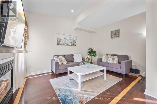 44 Wellspring Drive, Brampton, ON - Indoor Photo Showing Living Room With Fireplace