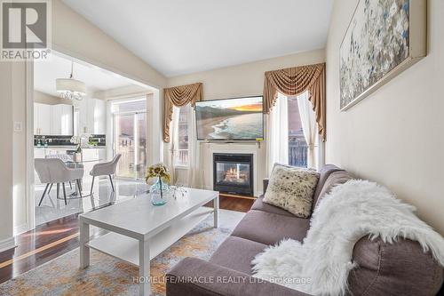 44 Wellspring Drive, Brampton, ON - Indoor Photo Showing Living Room With Fireplace