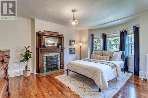 152 Sunnyside Avenue, Toronto, ON - Indoor Photo Showing Bedroom With Fireplace