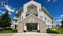 210 6 Lorne Place, Regina, SK  - Outdoor With Balcony With Facade 