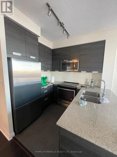 1302 - 5025 Four Springs Avenue, Mississauga, ON - Indoor Photo Showing Kitchen With Stainless Steel Kitchen With Double Sink With Upgraded Kitchen