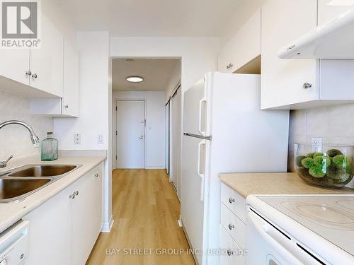 1119 - 1883 Mcnicoll Avenue, Toronto, ON - Indoor Photo Showing Kitchen With Double Sink