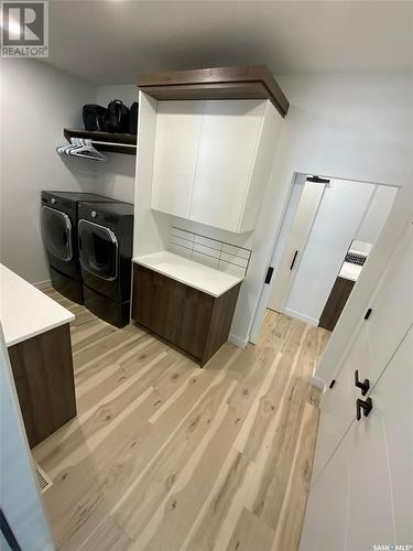 4 Huber Bay, Emerald Park, SK - Indoor Photo Showing Laundry Room