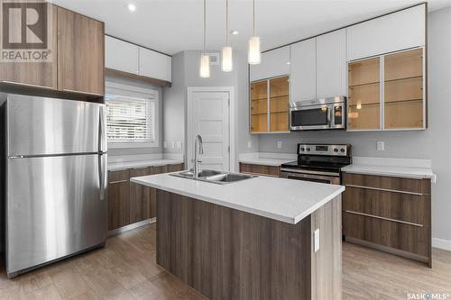 1018 Evergreen Boulevard, Saskatoon, SK - Indoor Photo Showing Kitchen With Double Sink With Upgraded Kitchen