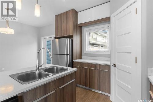 1018 Evergreen Boulevard, Saskatoon, SK - Indoor Photo Showing Kitchen With Double Sink