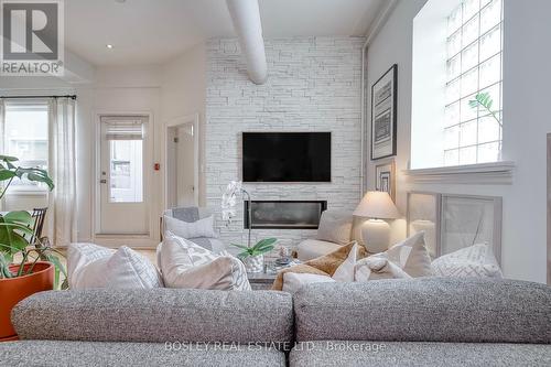 204 - 99 Chandos Avenue, Toronto, ON - Indoor Photo Showing Living Room With Fireplace