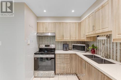 14 San Marino Way, Toronto, ON - Indoor Photo Showing Kitchen With Double Sink