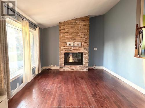 3610 Woodland, Windsor, ON - Indoor Photo Showing Living Room With Fireplace