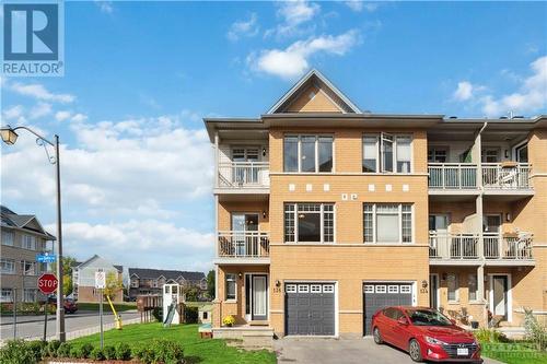 End unit w. 2 balconies - 136 Quito Private, Ottawa, ON - Outdoor With Balcony With Facade