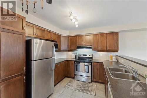 upgraded kitchen - 136 Quito Private, Ottawa, ON - Indoor Photo Showing Kitchen With Stainless Steel Kitchen With Double Sink