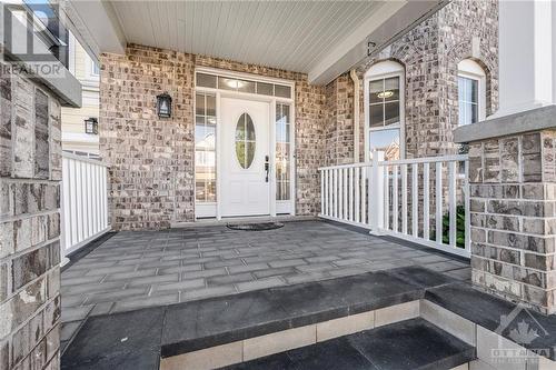 Spacious Porch with Patio stones and Camera Door Bell - 2212 Sunset Cove Circle, Ottawa, ON - Outdoor With Exterior