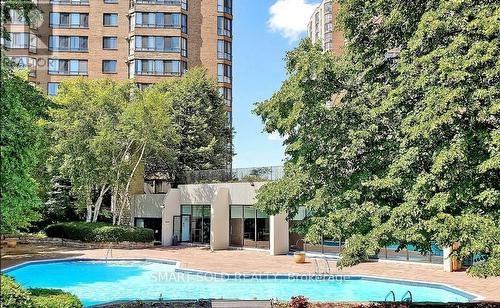 1519 - 75 Bamburgh Circle, Toronto, ON - Outdoor With In Ground Pool