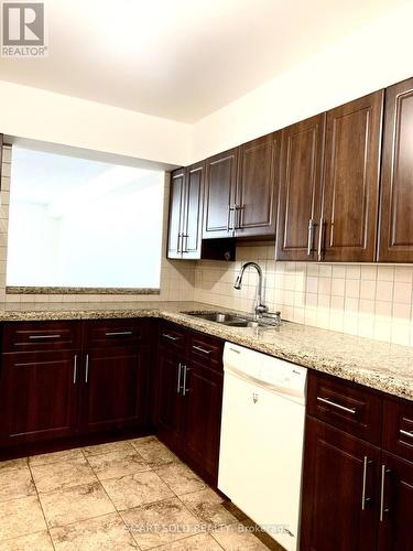 1519 - 75 Bamburgh Circle, Toronto, ON - Indoor Photo Showing Kitchen With Double Sink